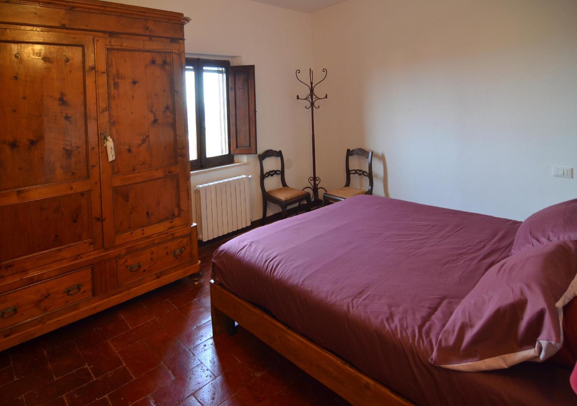 Appartamento Il Nespolo ซานจีมิญญาโน ภายนอก รูปภาพ