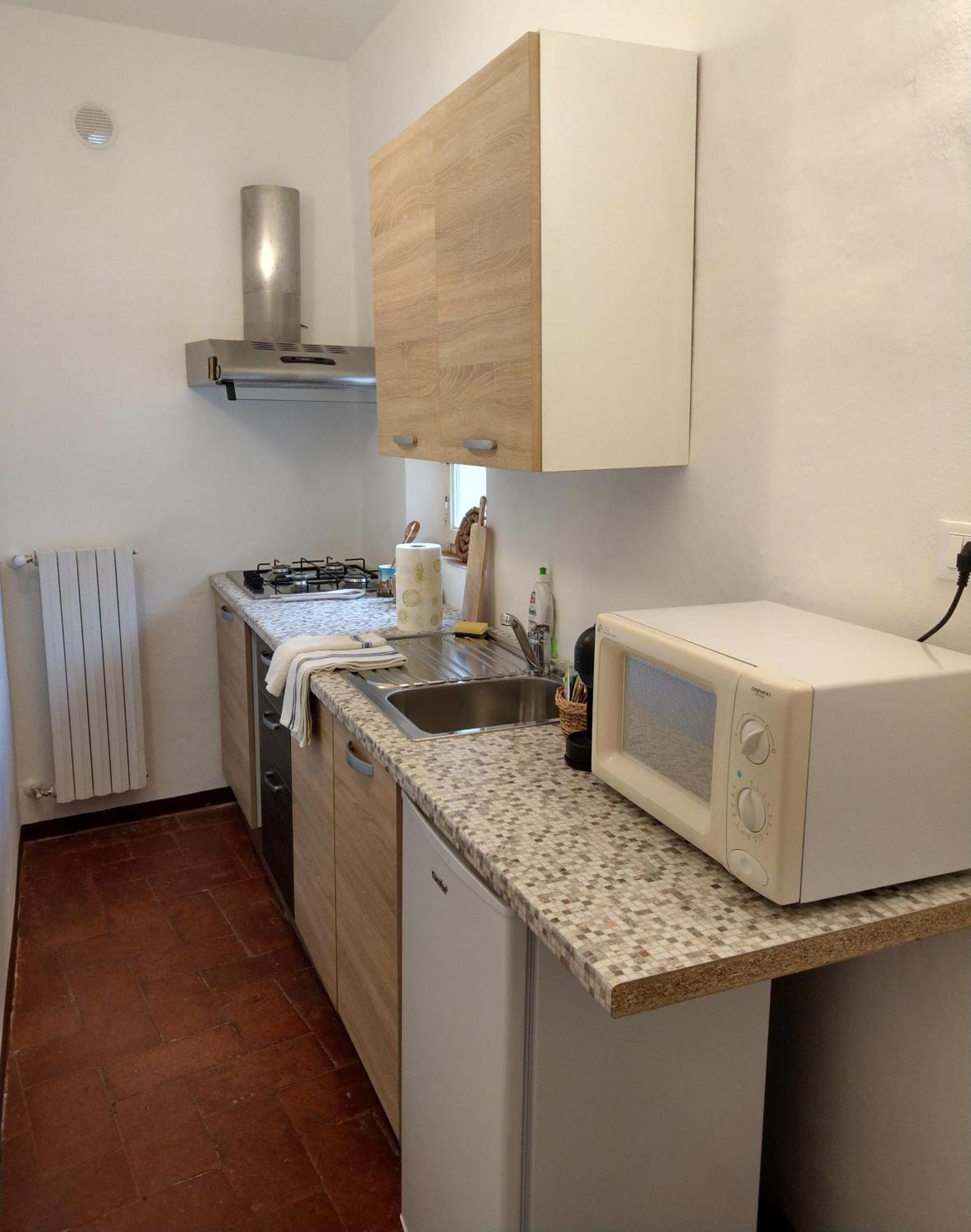 Appartamento Il Nespolo ซานจีมิญญาโน ภายนอก รูปภาพ